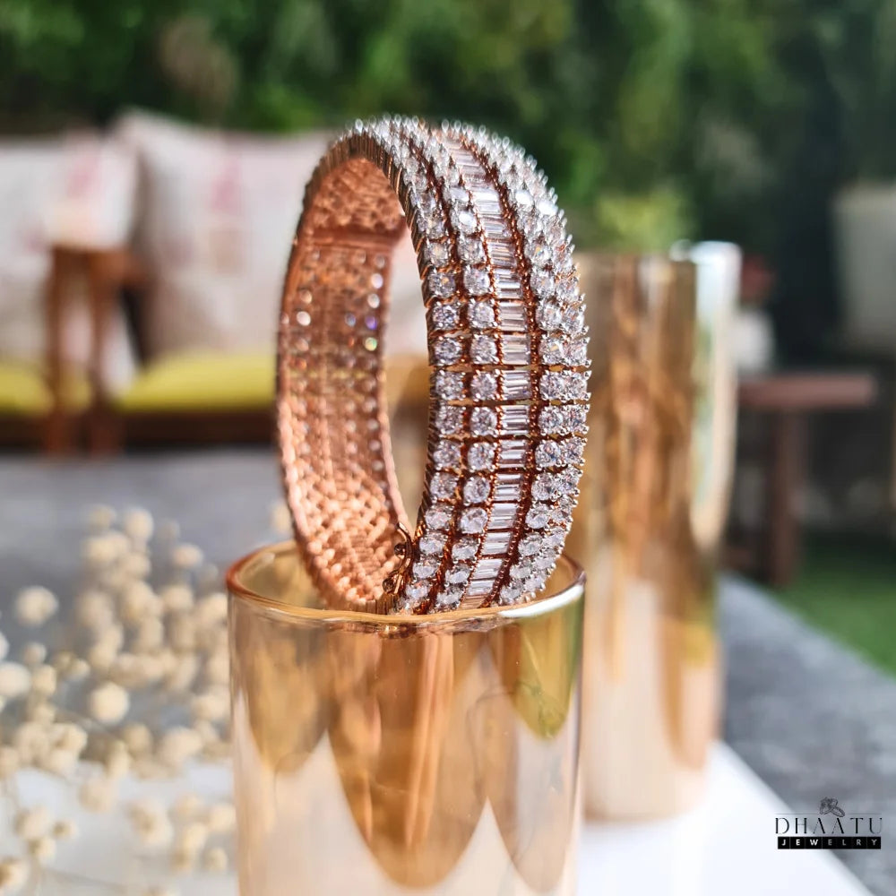 Video showcasing a 360-degree view of the Dhaatu Jewelry pink ruby and diamond simulant bangle bracelet.