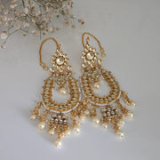 Pair of gold-plated Kundan and pearl Chandbali earrings with attached Sahare (ear chains) for traditional Indian look.