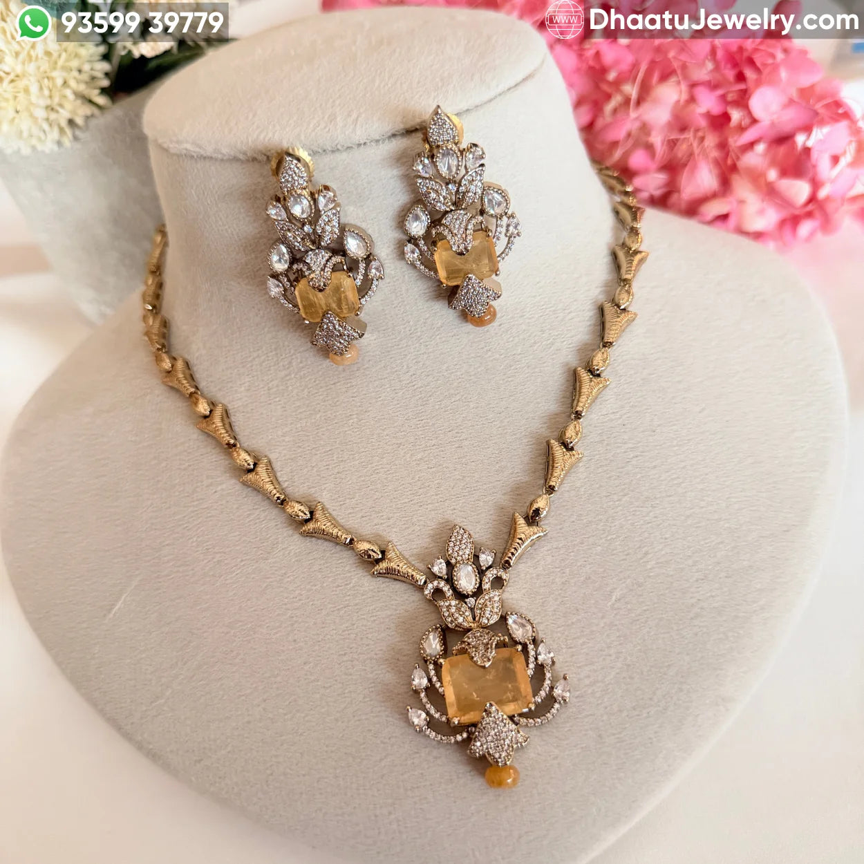 Handcrafted Floral Motif Necklace Set with Rectangular Baguette Stones and Contrast Drops