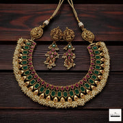 Antique Gold-Plated Guttapusalu-style Goddess Lakshmi Temple Jewelry Set with Kemp Stones and Pearl Clusters