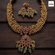 Antique Gold-Plated Guttapusalu Choker Set with Ruby & Emerald Stones