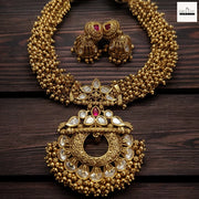 Antique Gold-Plated Guttapusalu Choker Set with Kundan & Ruby Accents