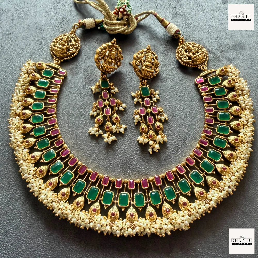 Antique Gold-Plated Guttapusalu-style Goddess Lakshmi Temple Jewelry Set with Kemp Stones and Pearl Clusters