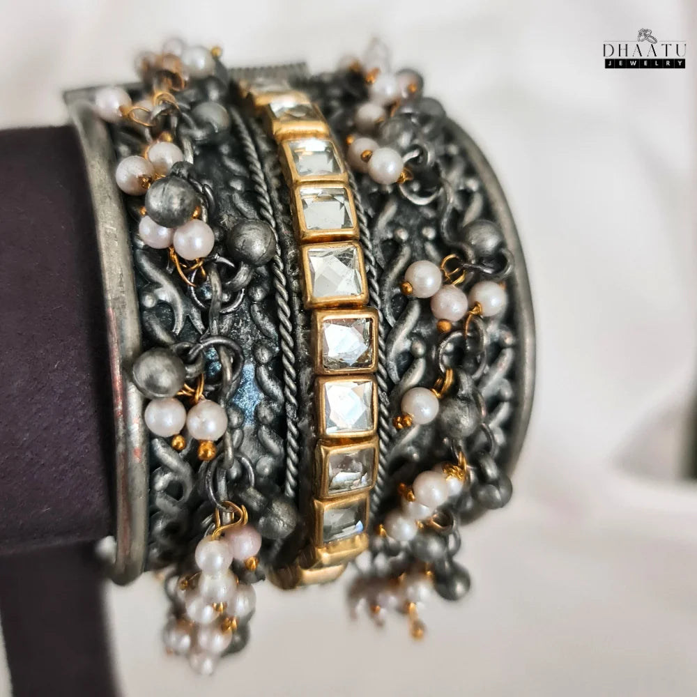 Handcrafted antique design on an oxidized silver-plated handcuff bangle