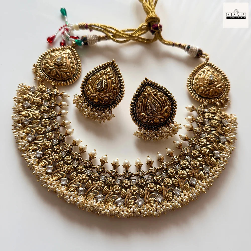 Antique Gold-Plated Nakshi Choker Necklace Set with White Stones and Pearl Clusters