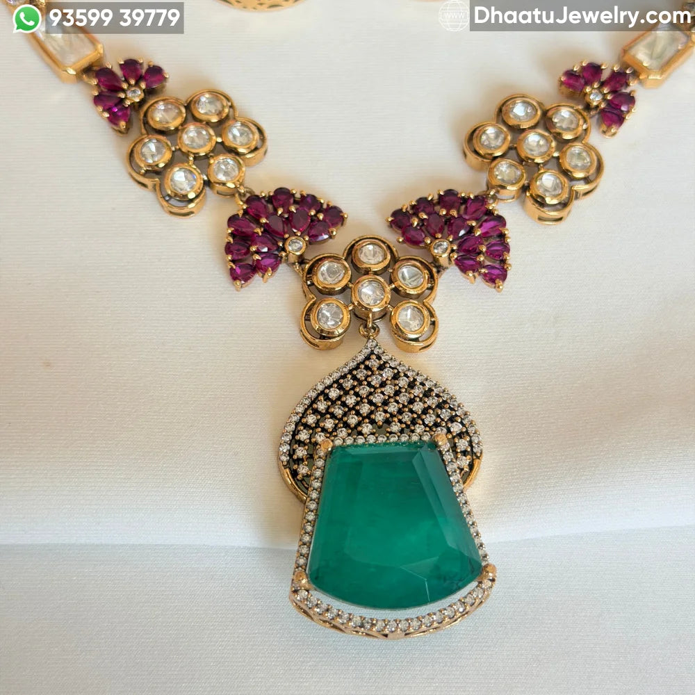 Handcrafted Gold-Plated Emerald Green Stone Collar Set with Real Polki & Moissanite Accents – Ruby Pink Meenakari Detail Earrings and Necklace