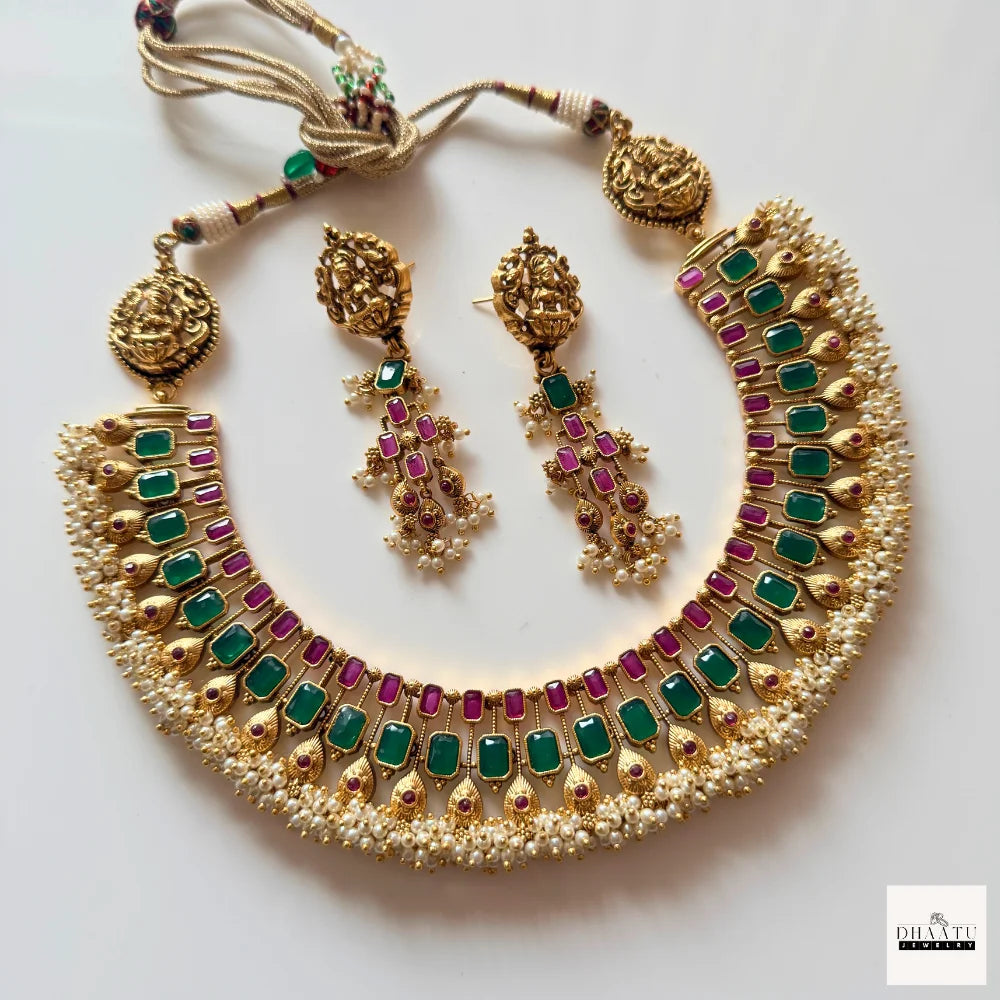 Antique Gold-Plated Guttapusalu-style Goddess Lakshmi Temple Jewelry Set with Kemp Stones and Pearl Clusters