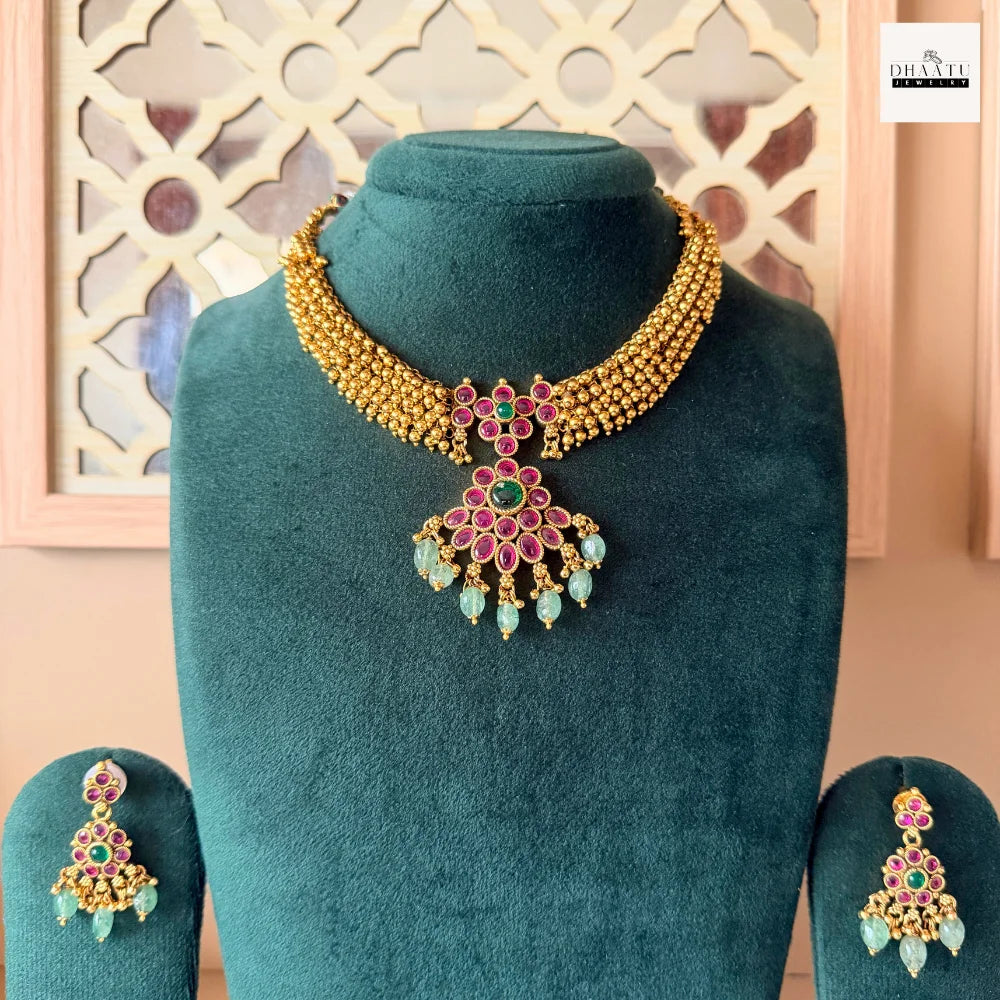 Antique Gold-Plated Guttapusalu Choker Set with Ruby & Emerald Stones