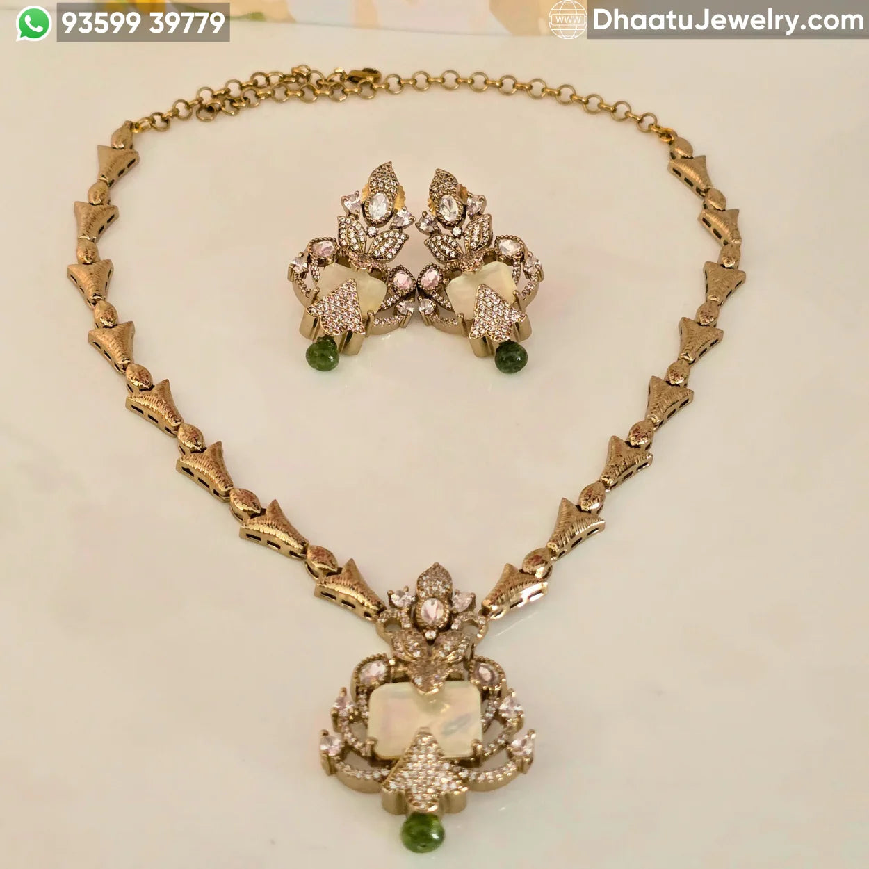 Handcrafted Floral Motif Necklace Set with Rectangular Baguette Stones and Contrast Drops