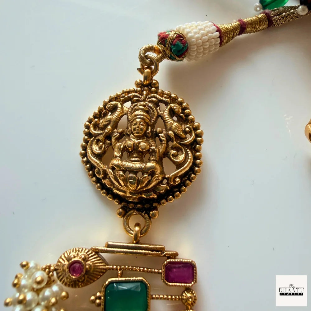 Antique Gold-Plated Guttapusalu-style Goddess Lakshmi Temple Jewelry Set with Kemp Stones and Pearl Clusters