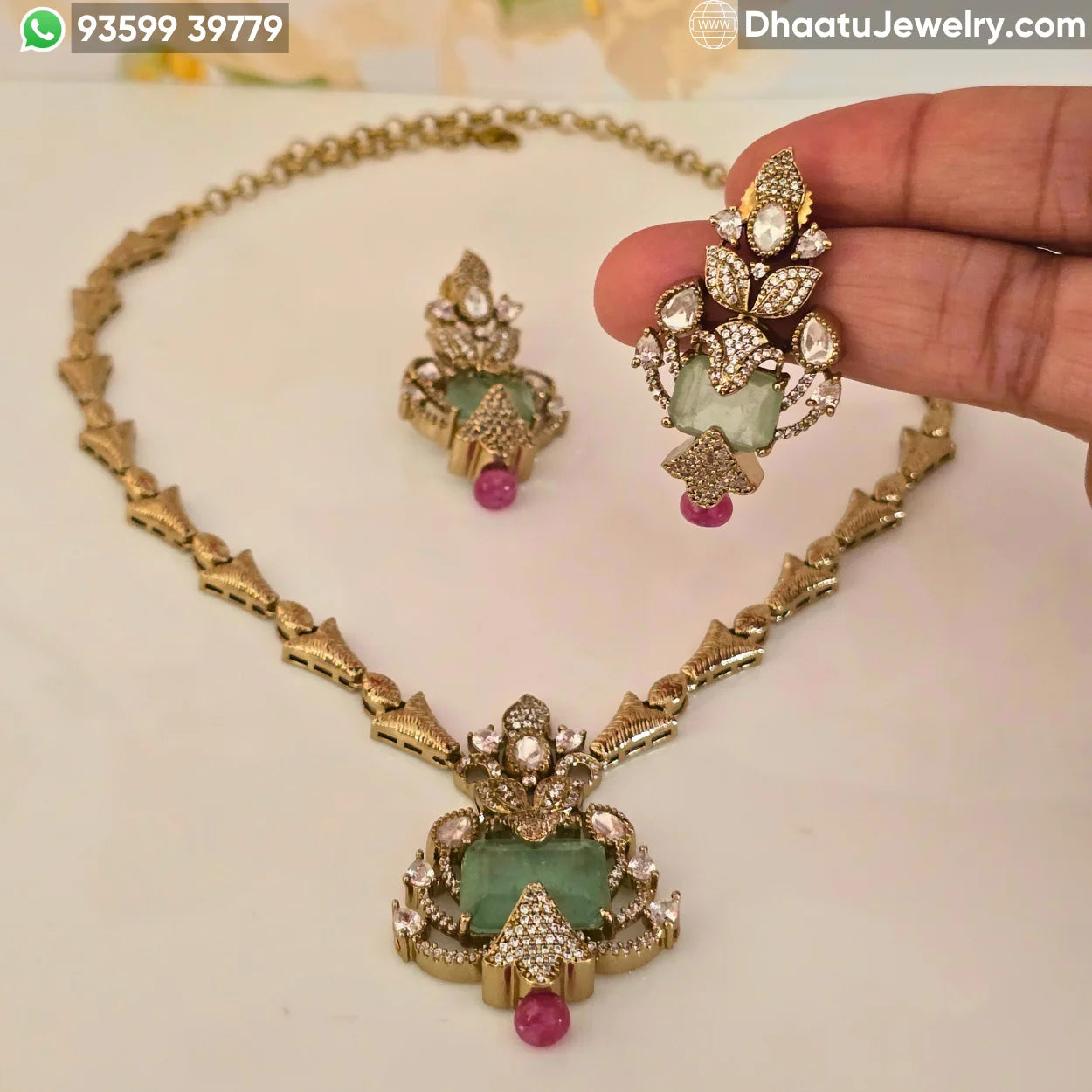 Handcrafted Floral Motif Necklace Set with Rectangular Baguette Stones and Contrast Drops