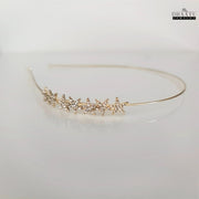 Full view of modern Western hairband with cubic zirconia stars on a light background, highlighting its contemporary style.