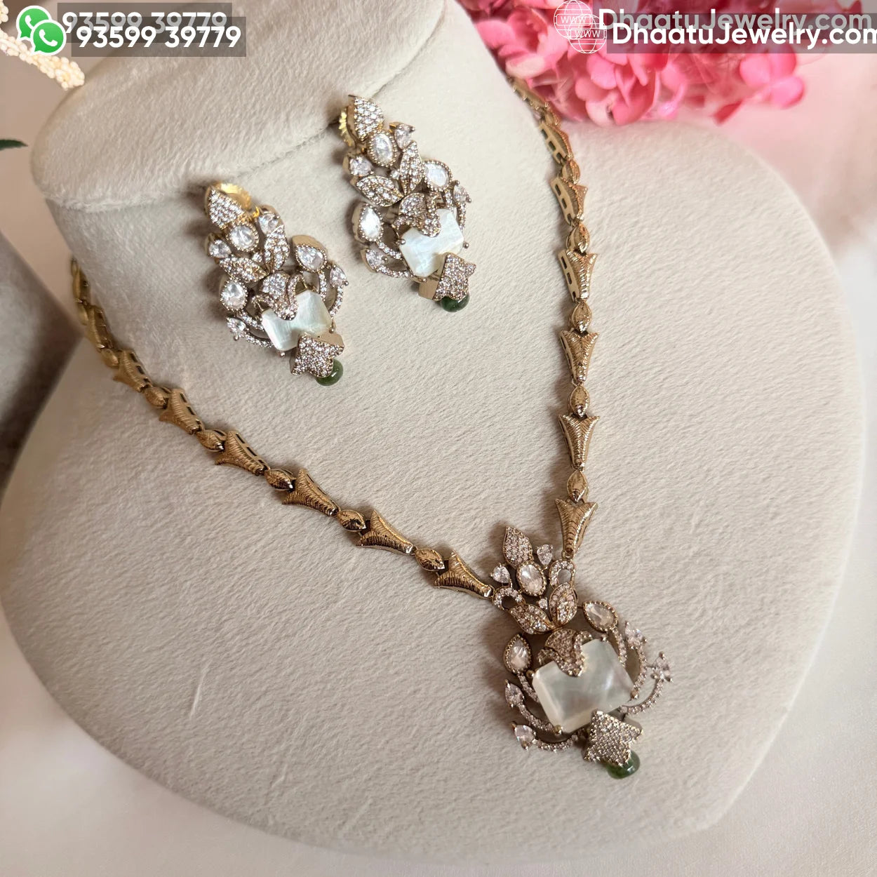 Handcrafted Floral Motif Necklace Set with Rectangular Baguette Stones and Contrast Drops