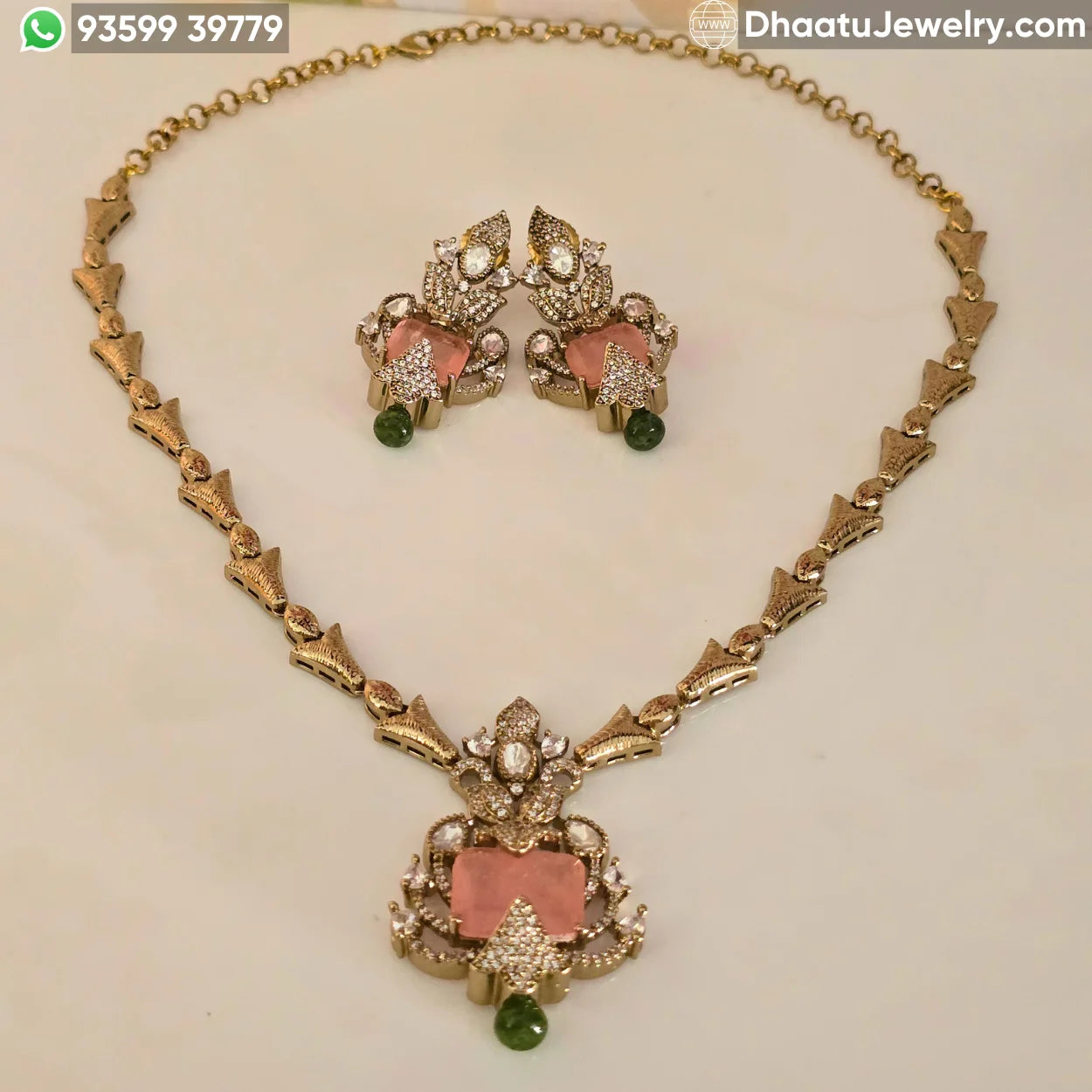 Handcrafted Floral Motif Necklace Set with Rectangular Baguette Stones and Contrast Drops
