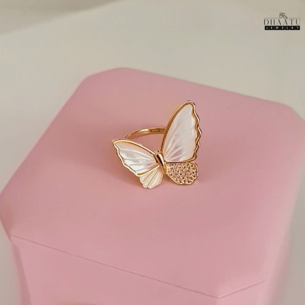 Load video: Mother of Pearl Butterfly Ring with Crystal Accents - Gold Tone