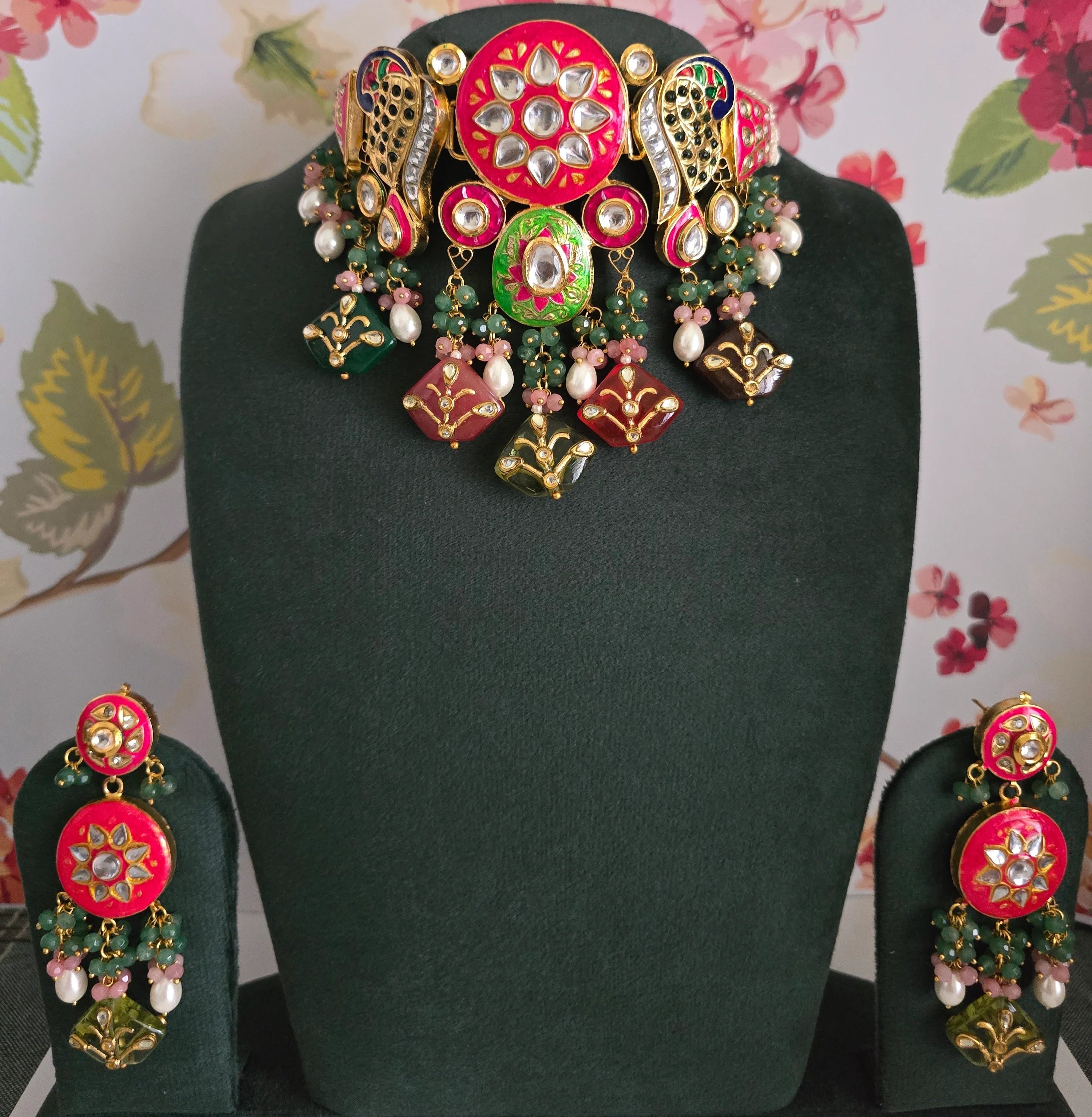 Vibrant red Hand-Painted Kundan Meenakari Choker Necklace Set on a display mannequin, ideal for Indian bridal and festive occasions.