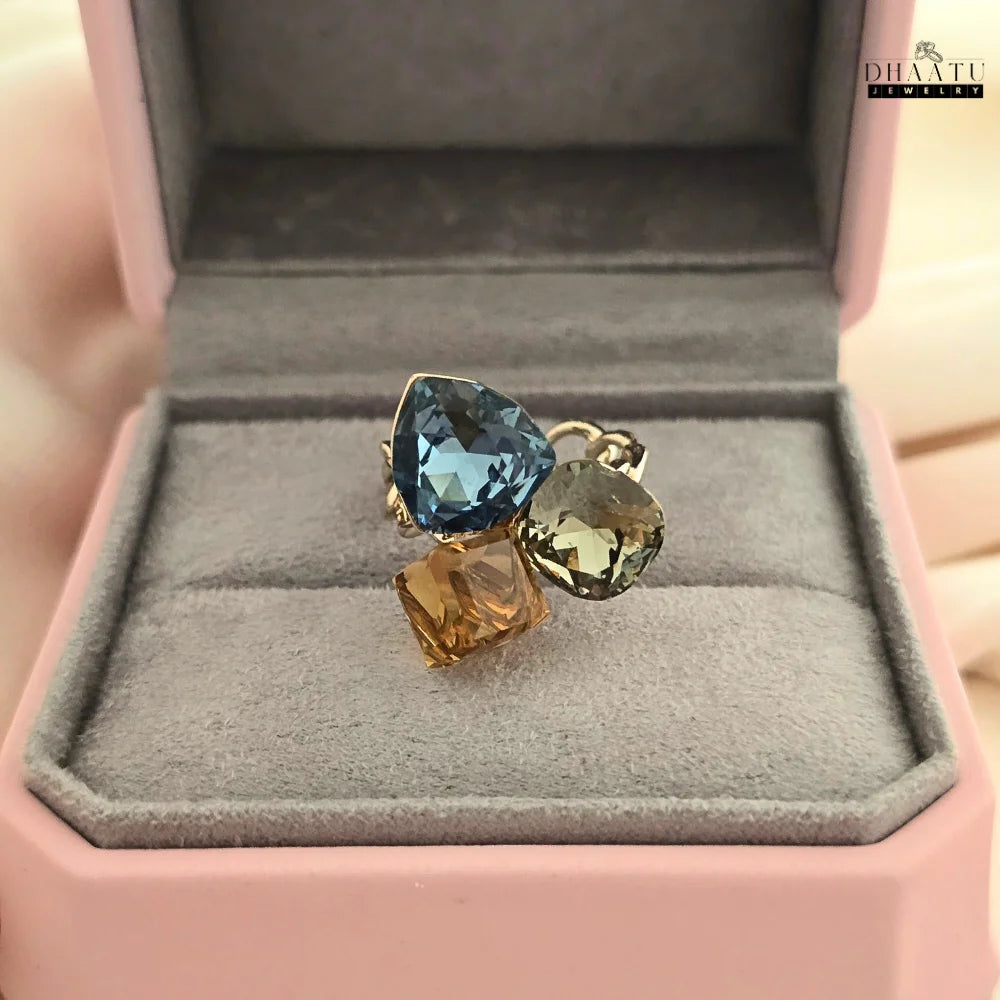 The rose gold cocktail ring displayed inside a pink jewelry box, perfect for gifting.
