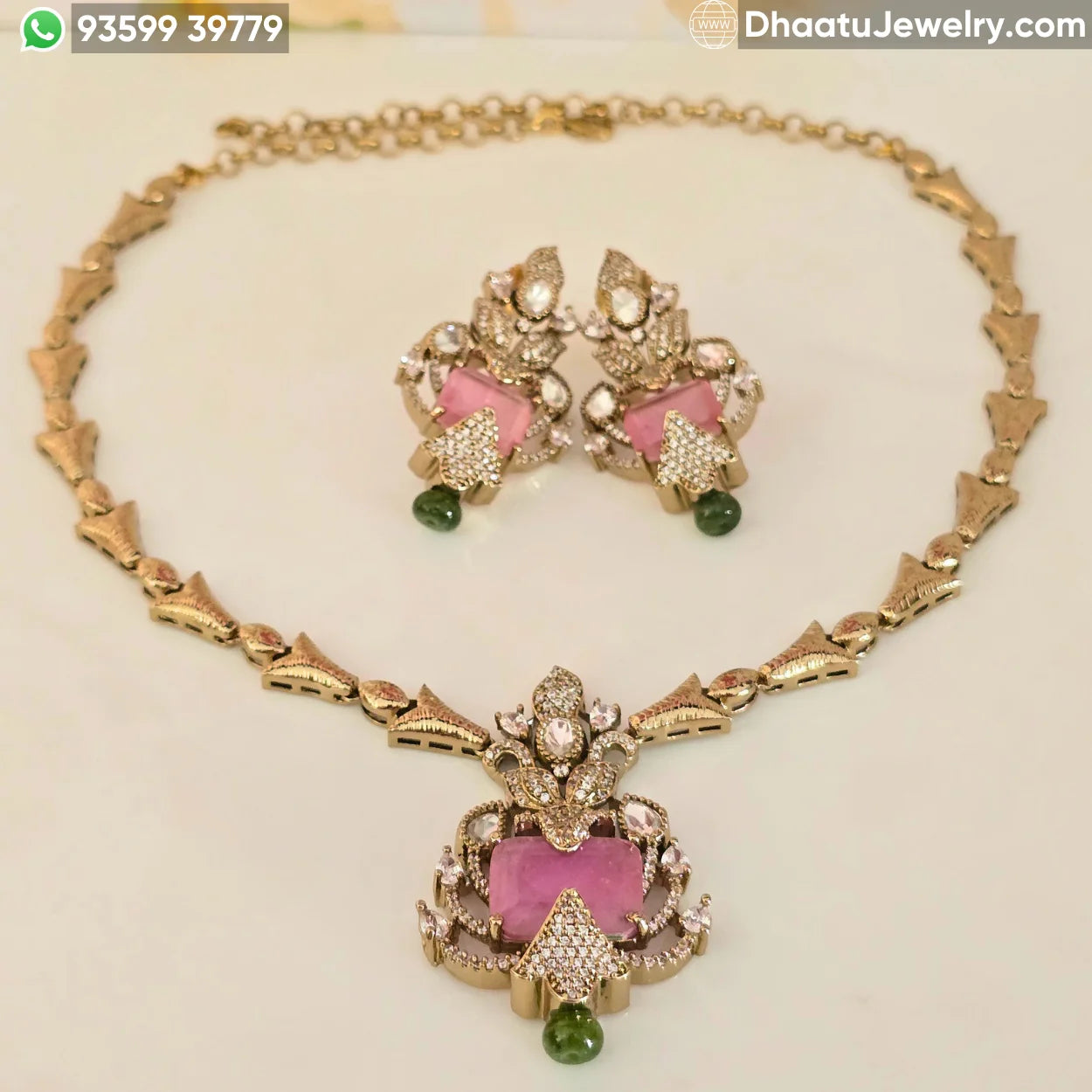 Handcrafted Floral Motif Necklace Set with Rectangular Baguette Stones and Contrast Drops
