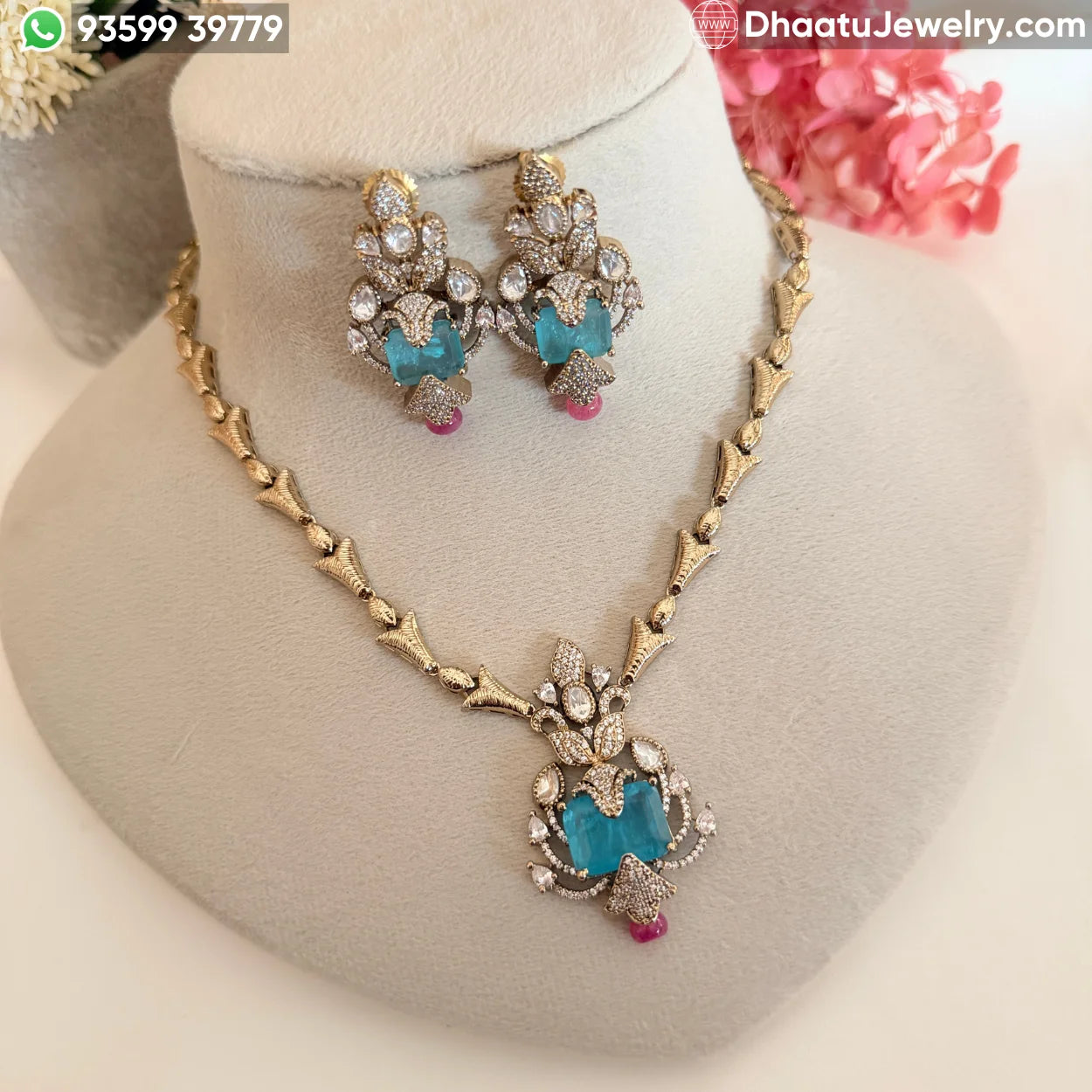 Handcrafted Floral Motif Necklace Set with Rectangular Baguette Stones and Contrast Drops