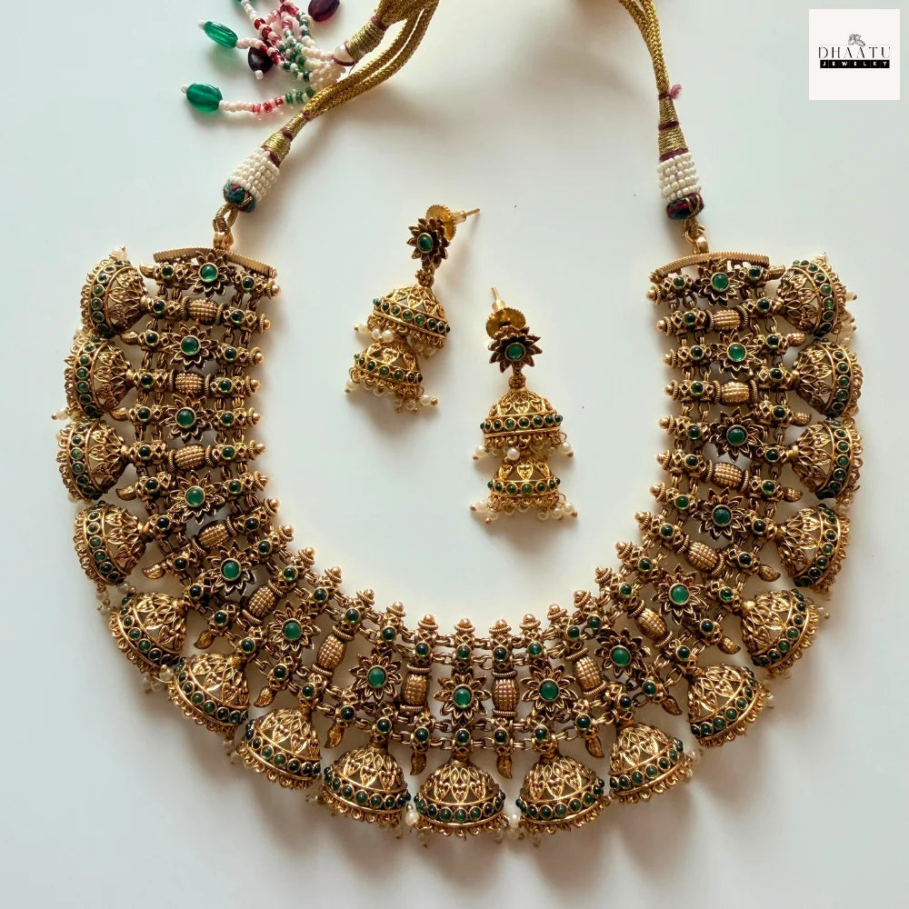 Antique Gold-Plated Jhumka Choker Necklace Set with Emerald Green Accents and Pearl Droplets