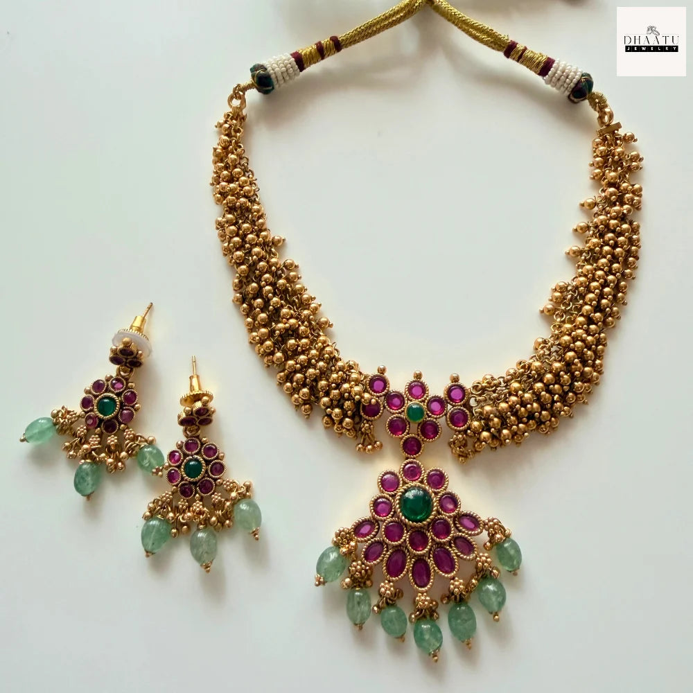 Antique Gold-Plated Guttapusalu Choker Set with Ruby & Emerald Stones