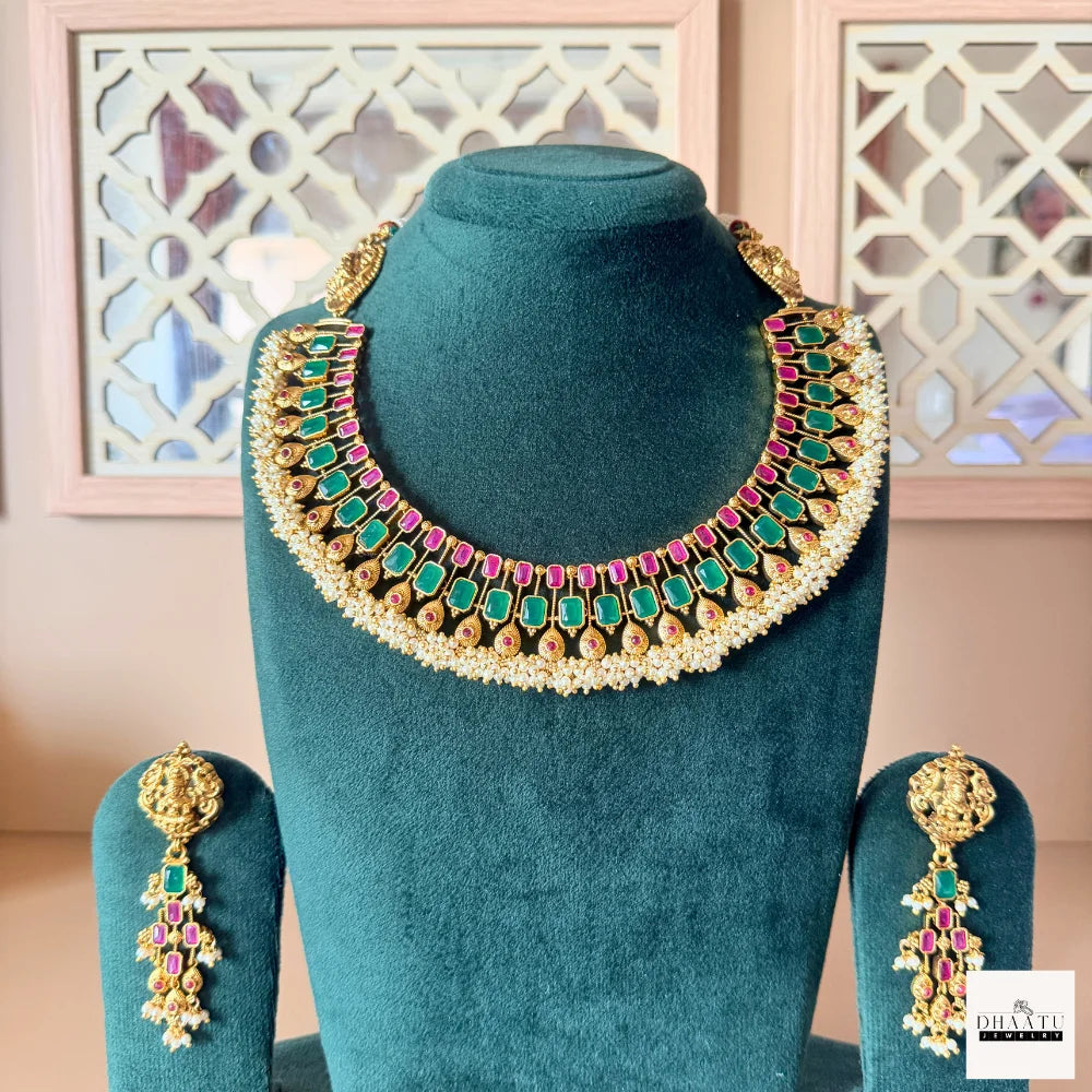 Antique Gold-Plated Guttapusalu-style Goddess Lakshmi Temple Jewelry Set with Kemp Stones and Pearl Clusters