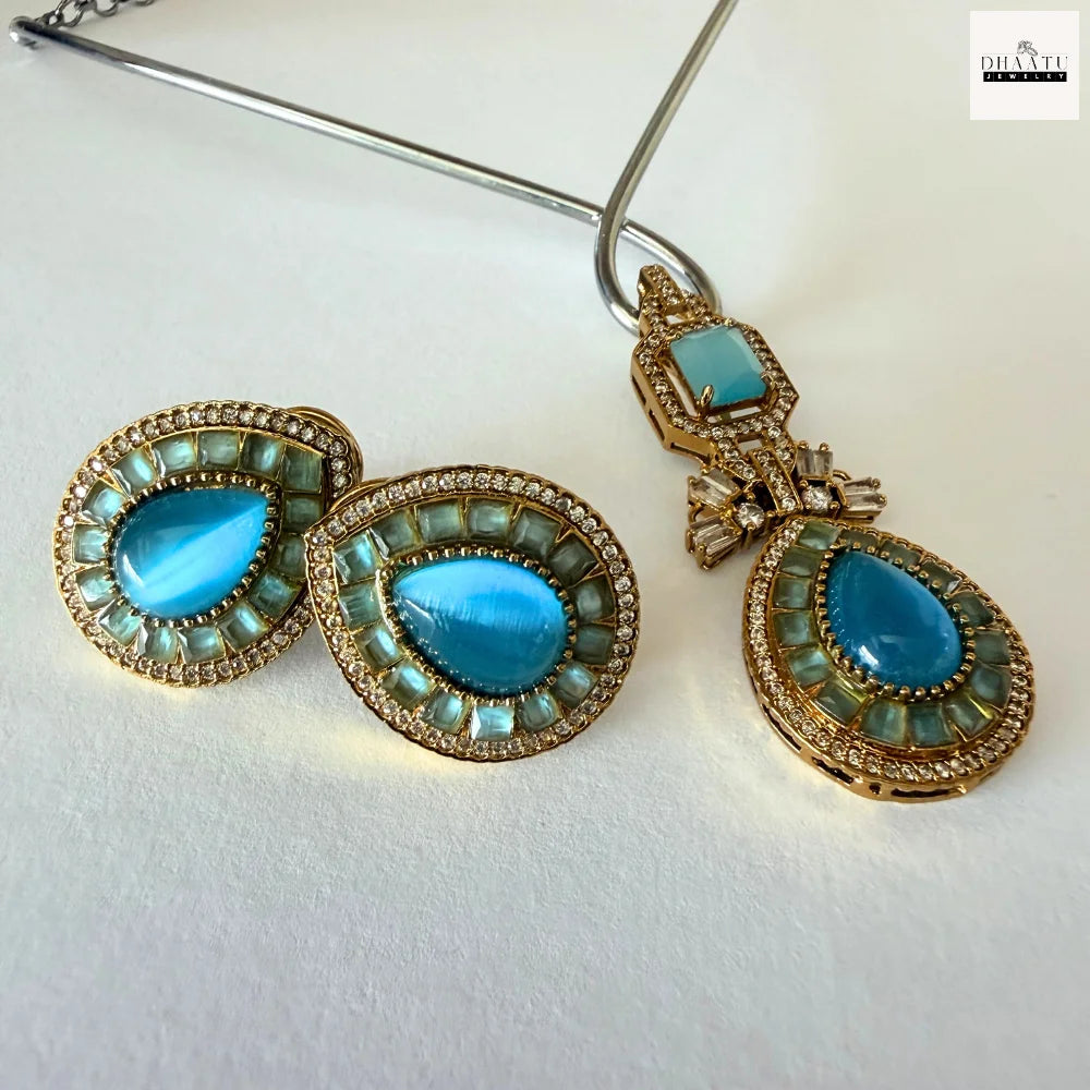 Pear-Cut Gemstone Fusion Jewelry Set – Gold-Plated Teardrop Necklace & Studs with Baguette Halo